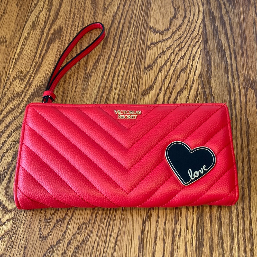 Victoria’s Secret V-quilted wallet/wristlet in red. New without tags